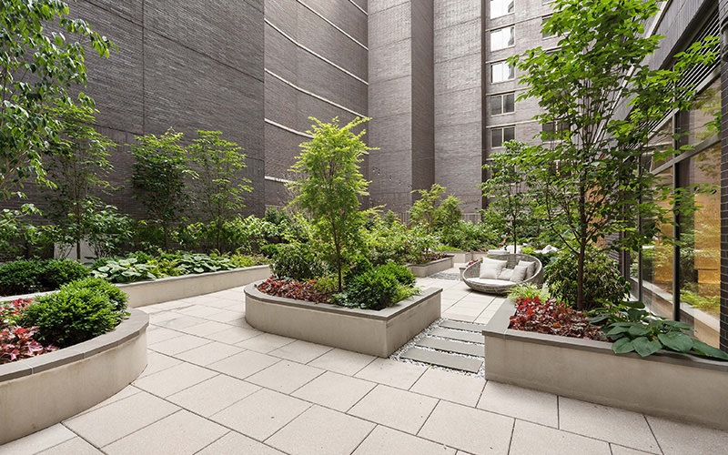 a courtyard with potted plants