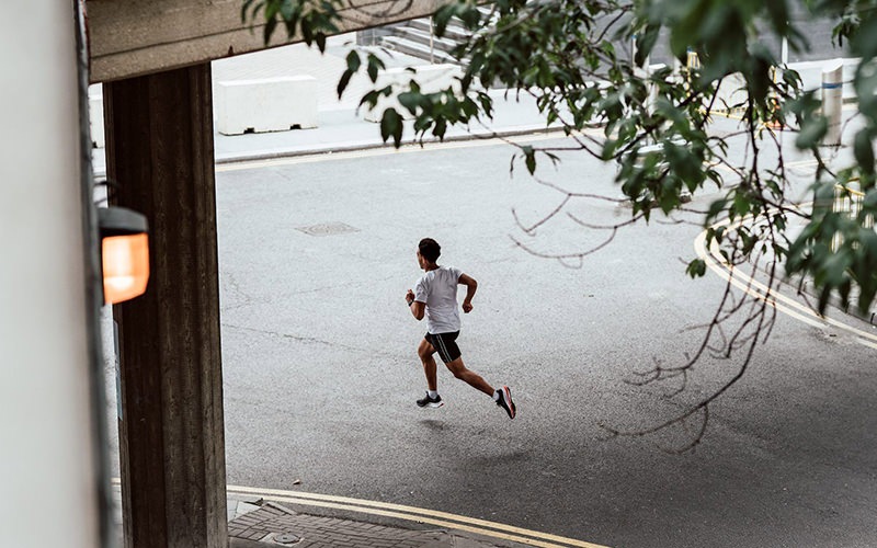 a man running on a street